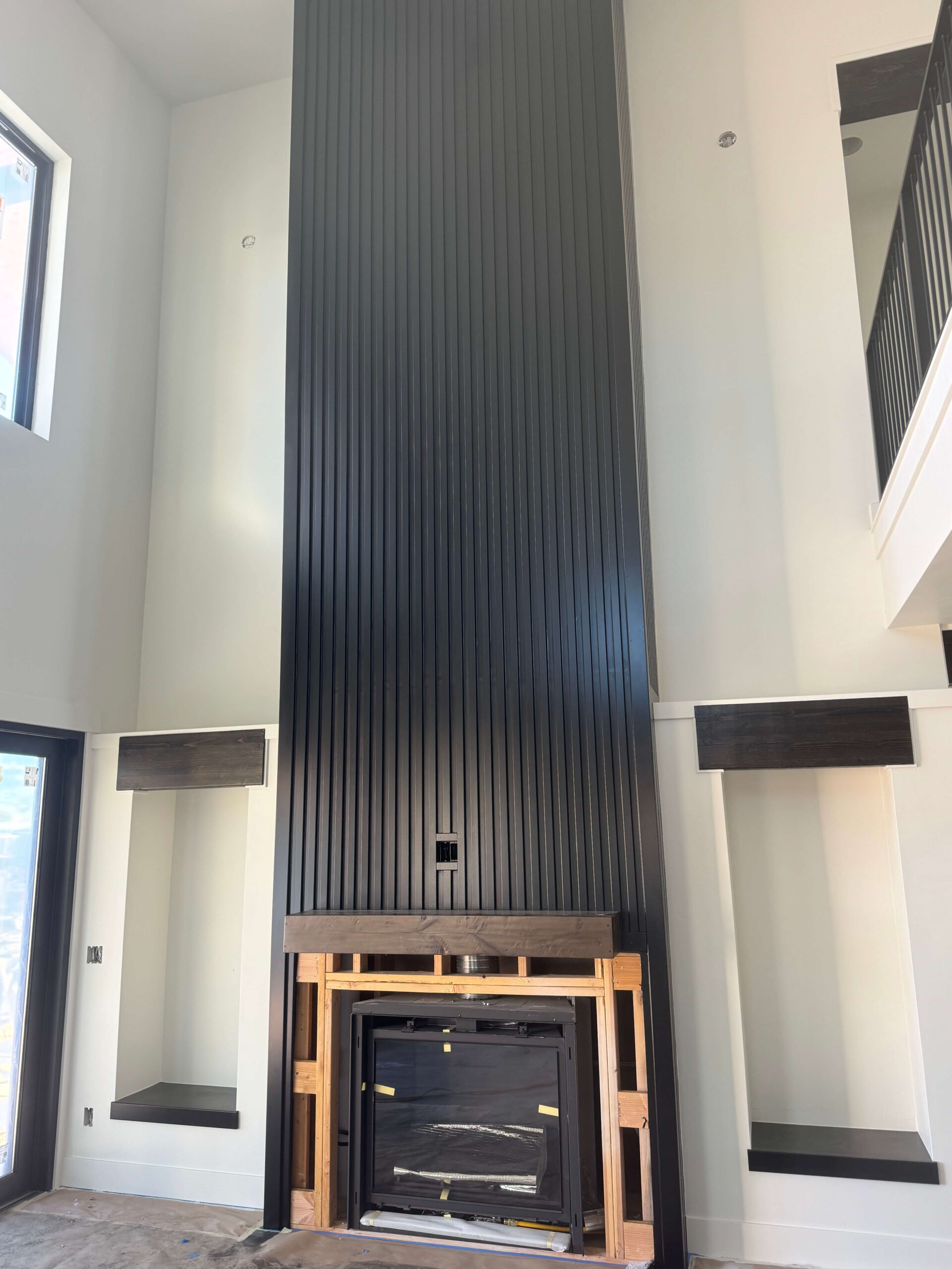 two-story slat fireplace pop out